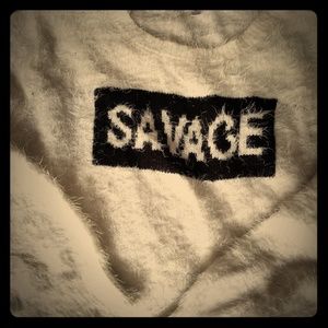 Trendy white fuzzy "SAVAGE " sweater  by MAO.